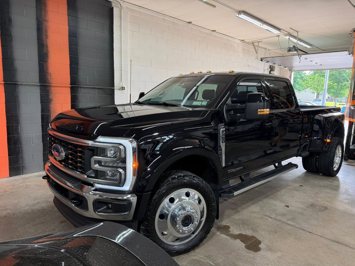 A black Ford F-450 Super Duty dually finished to a mirror gloss by Shoreless Detailing