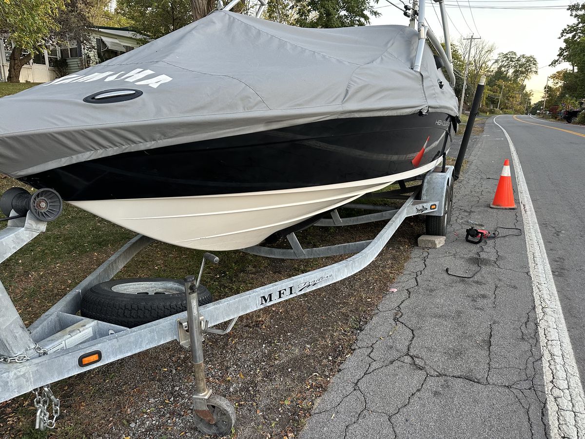 The same hull after detailing, cleaned back to bright white gelcoat