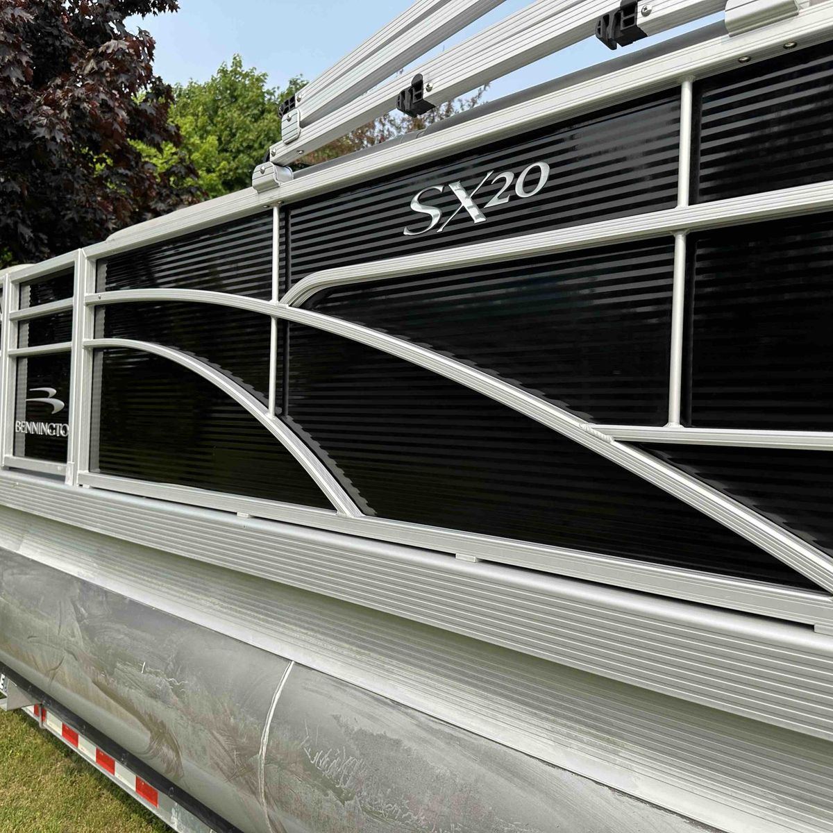 Detailed Bennington pontoon with polished aluminium railings