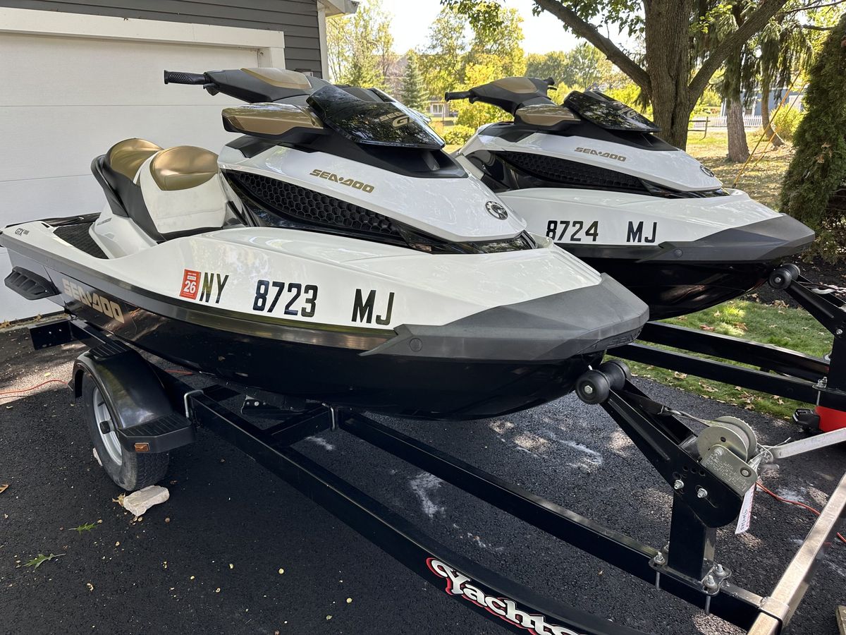 Two detailed Sea-Doo jetskis on a trailer after a Shoreless Detailing service